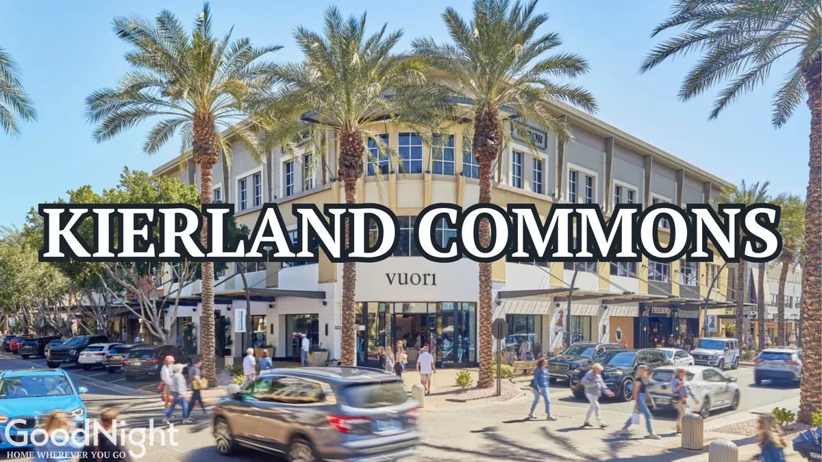 This vibrant exterior image shows the bustling Kierland Commons shopping area, with palm trees, people walking, and lively storefronts. The outdoor setting encourages exploration and captures the family-friendly energy of Scottsdale’s popular retail and dining destinations.